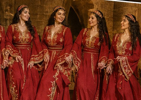 Lebanese folk dancers in traditional red and gold costumes
